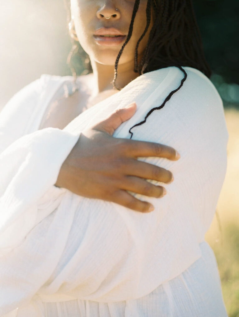 Beautiful black woman dressed in white